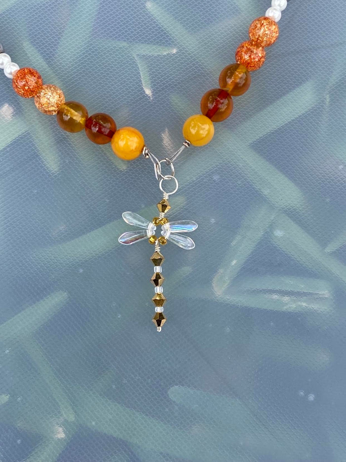 25" with 2" extender DragonFly SS, Swarvoski Crystal, and Czechoslovakian glass made by artist Kendra Santa Cruz