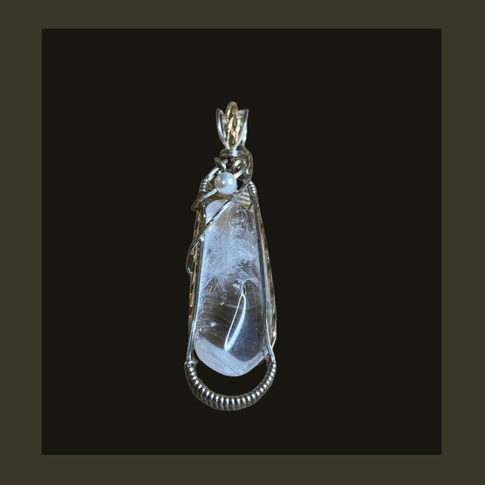 Featured Michael Collings Gold/Silver Wire Wrap Crystal. "The cold never bothered me anyway"