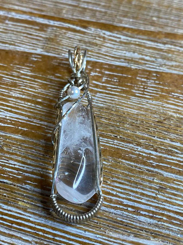 Featured Michael Collings Gold/Silver Wire Wrap Crystal. "The cold never bothered me anyway"