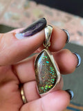 Smooth curved ammolite pendant in 925 Sterling Silver