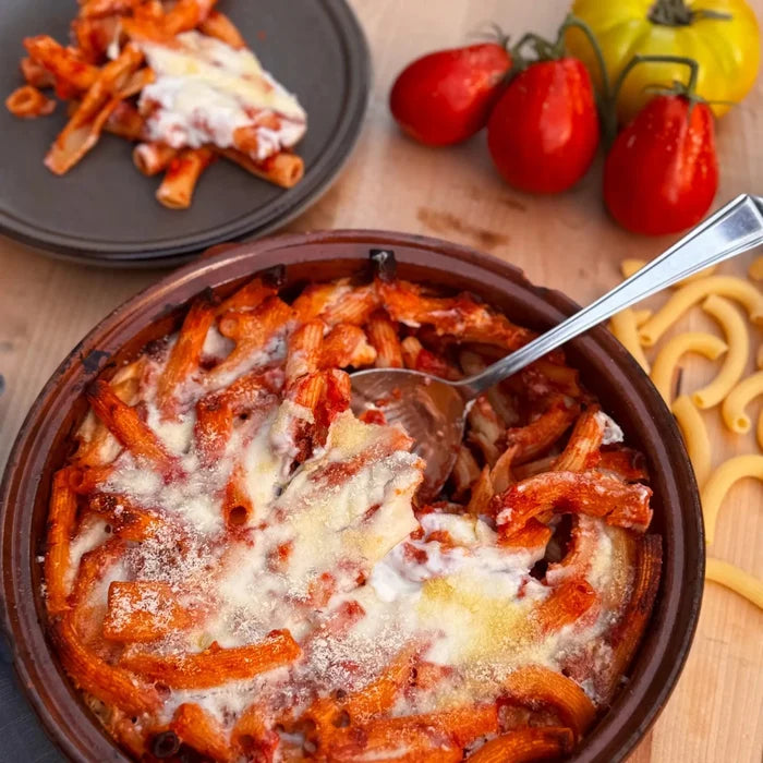 baked sedani pasta with red sauce and bechemal sauce